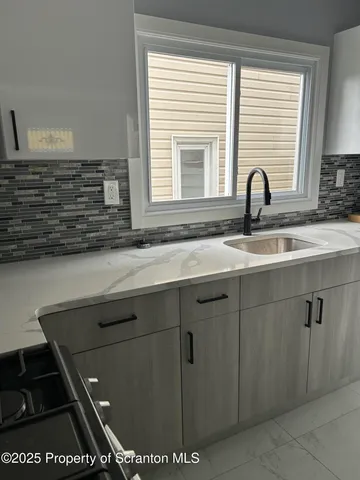 a view of a sink and window