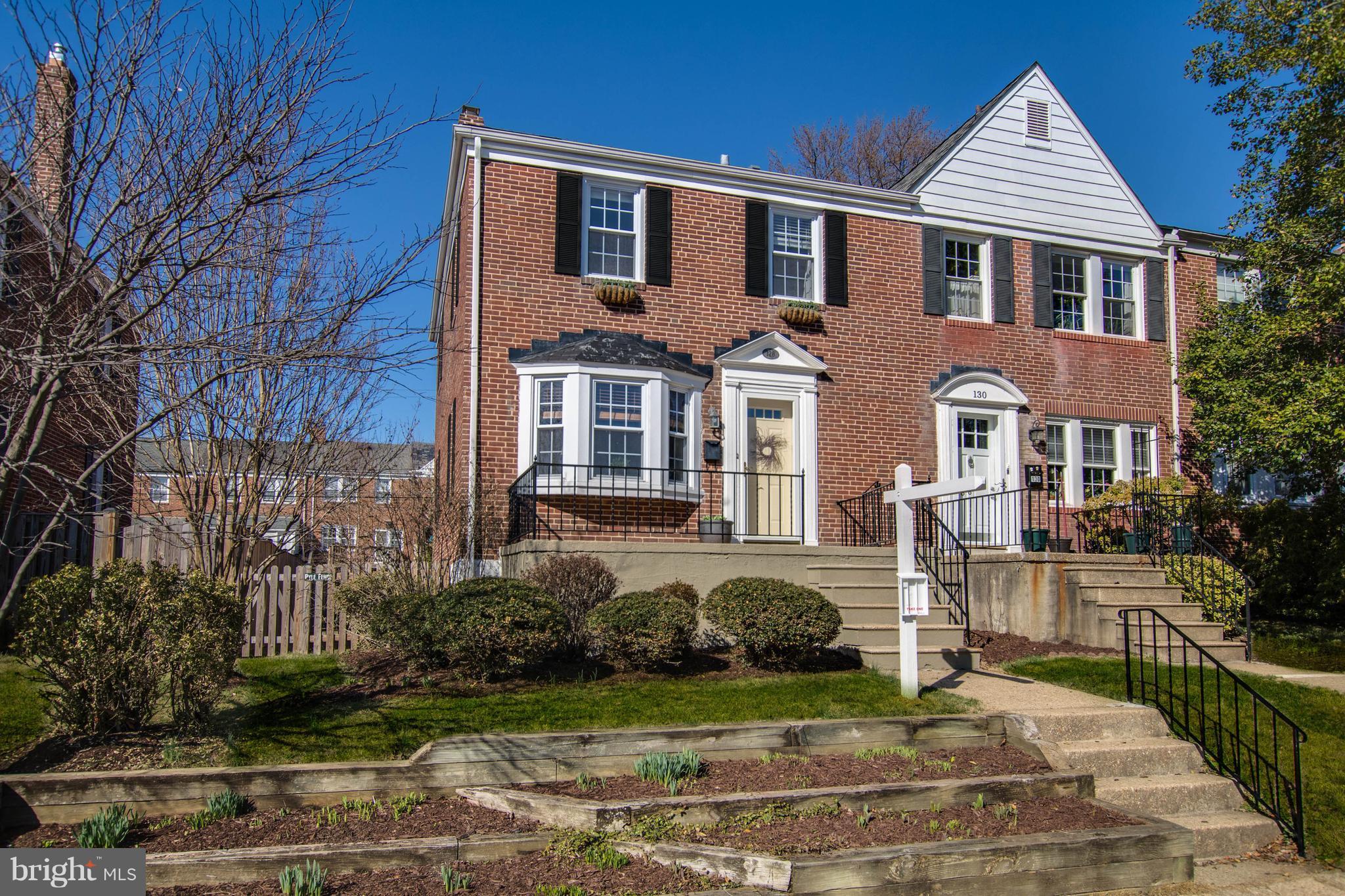 128 Overbrook Road Baltimore, MD 21212 - Photo 1 of 29 a front view of a house with a yard