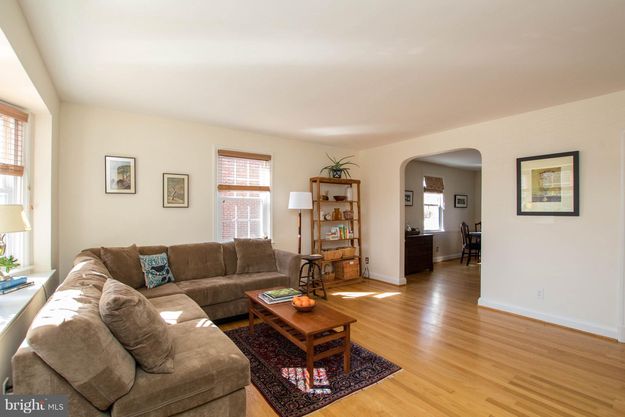 128 Overbrook Road Baltimore, MD 21212 - Photo 2 of 29 a living room with furniture and wooden floor