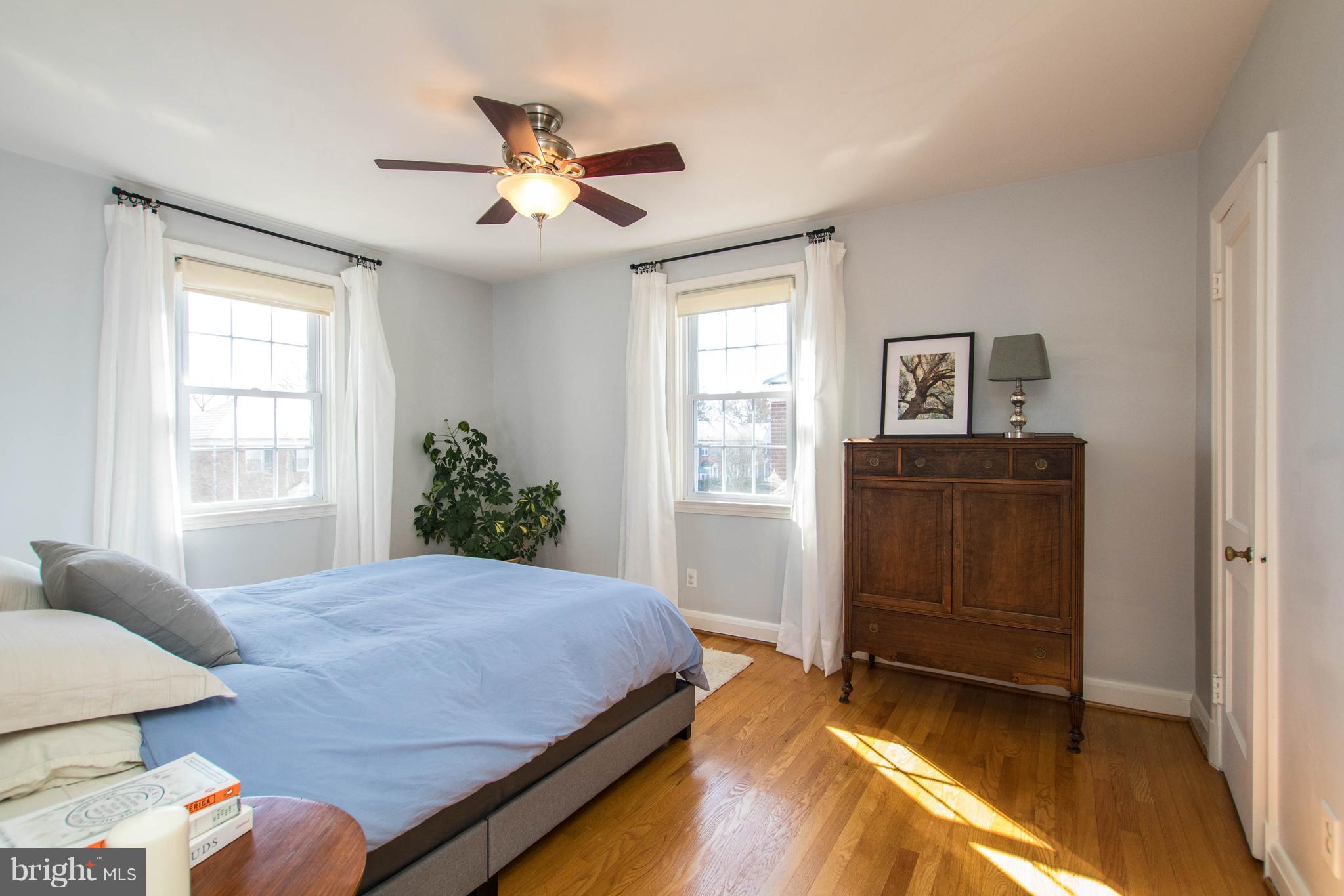 128 Overbrook Road Baltimore, MD 21212 - Photo 11 of 29 a bedroom with a bed and a window