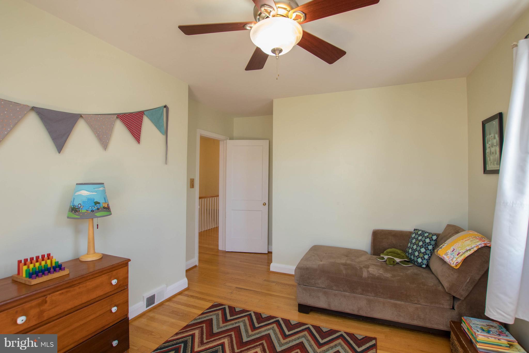 128 Overbrook Road Baltimore, MD 21212 - Photo 16 of 29 a living room with furniture and a window