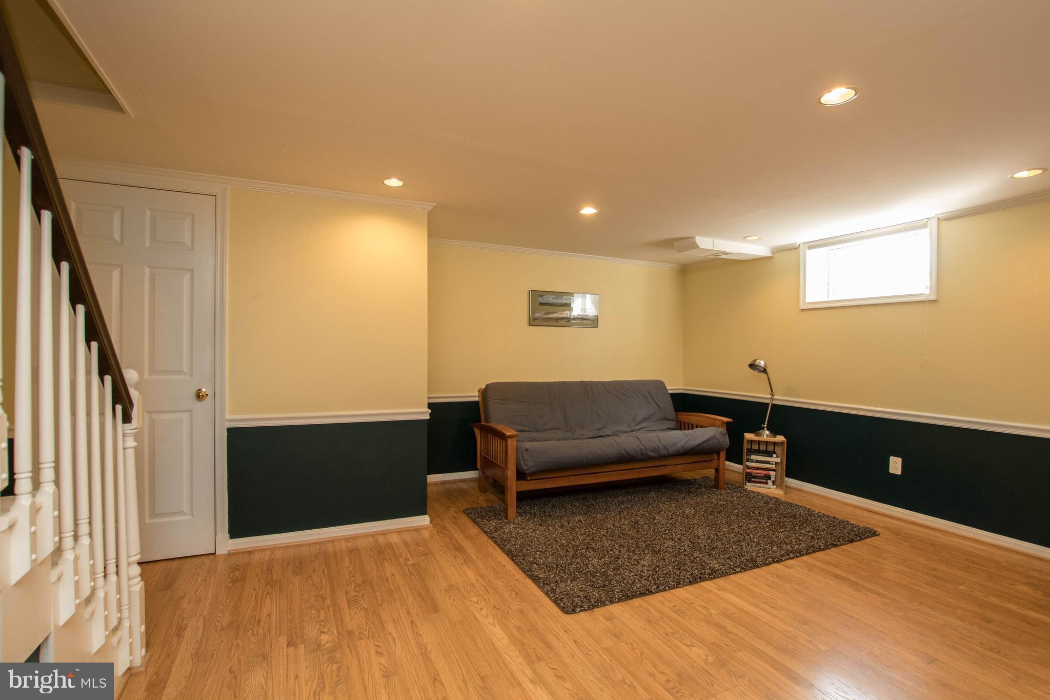 128 Overbrook Road Baltimore, MD 21212 - Photo 20 of 29 a living room with furniture and a rug