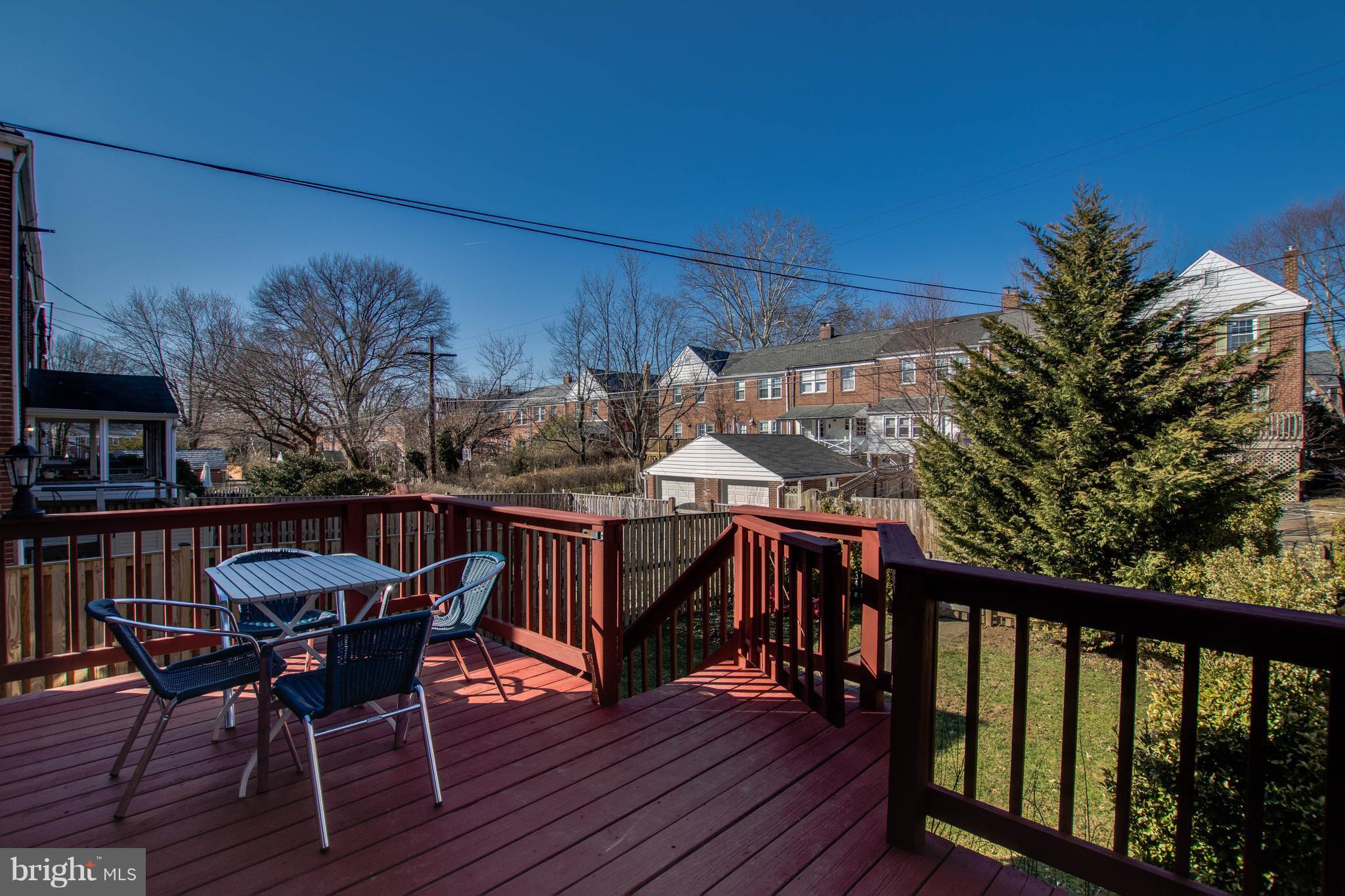 128 Overbrook Road Baltimore, MD 21212 - Photo 24 of 29 a view of a chairs and table on the deck