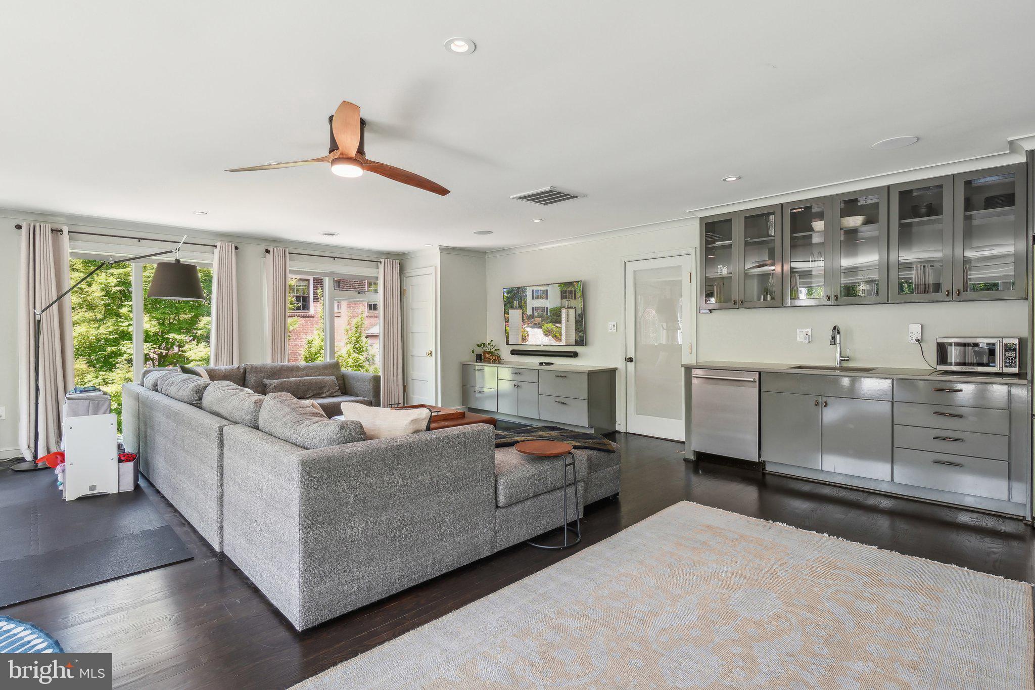 3626 Brandywine Street Northwest Washington, DC 20008 - Photo 16 of 42 a living room with furniture and windows