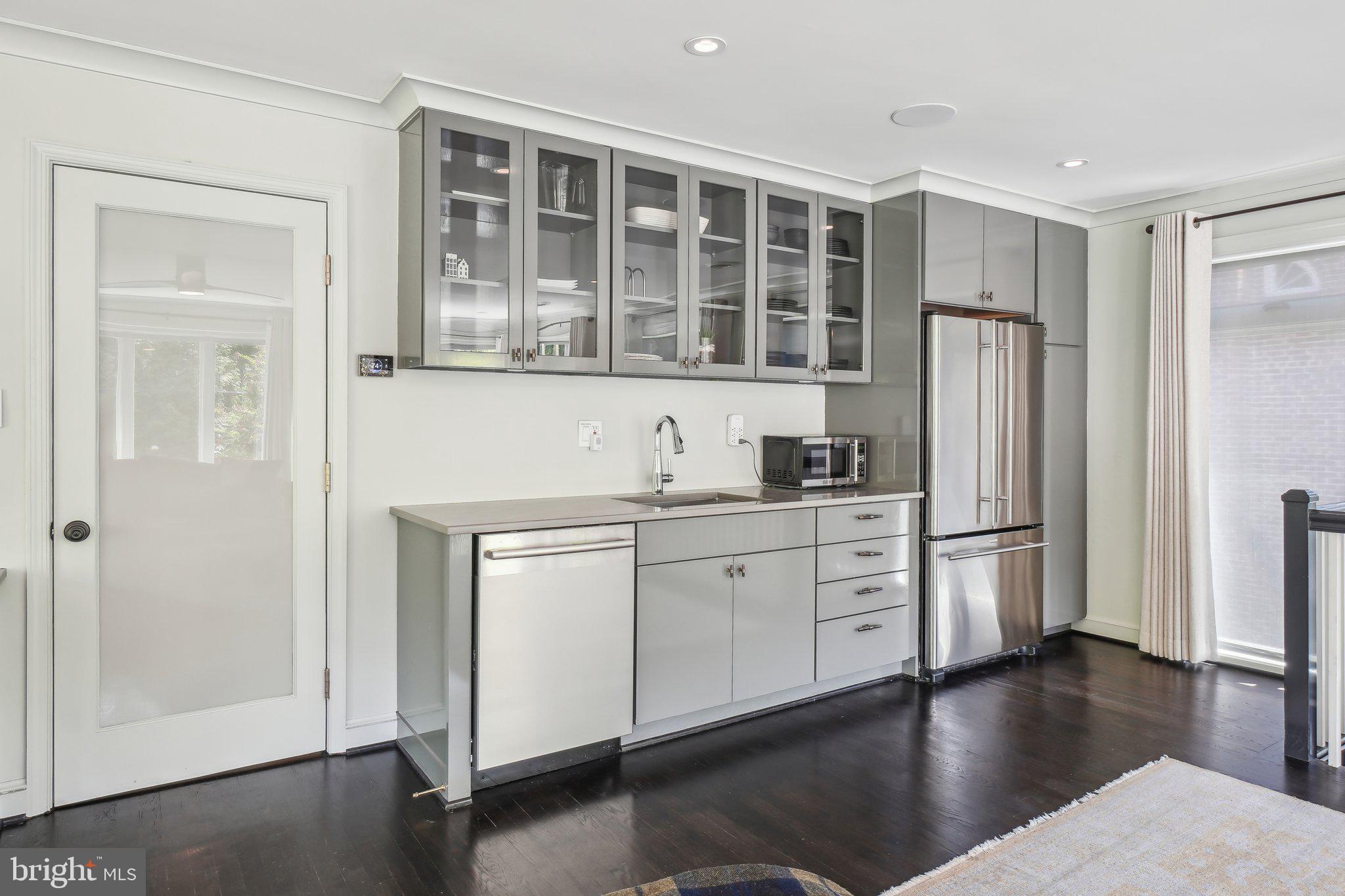 3626 Brandywine Street Northwest Washington, DC 20008 - Photo 18 of 42 a kitchen with a refrigerator and a sink