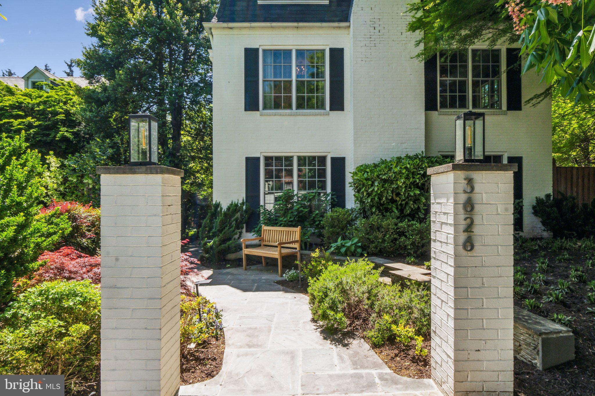 3626 Brandywine Street Northwest Washington, DC 20008 - Photo 2 of 42 a backyard of a house with outdoor seating and plants