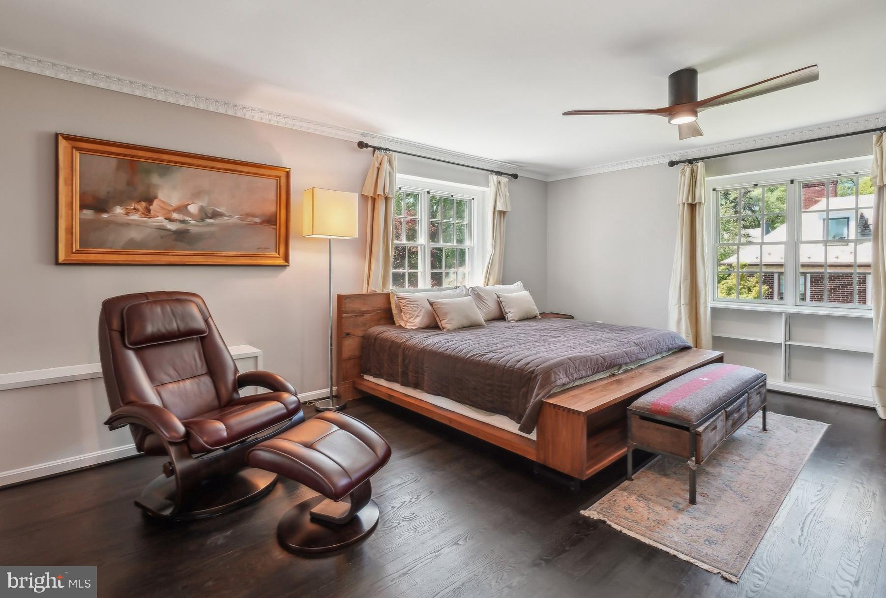 3626 Brandywine Street Northwest Washington, DC 20008 - Photo 29 of 42 a bedroom with a bed and a large window