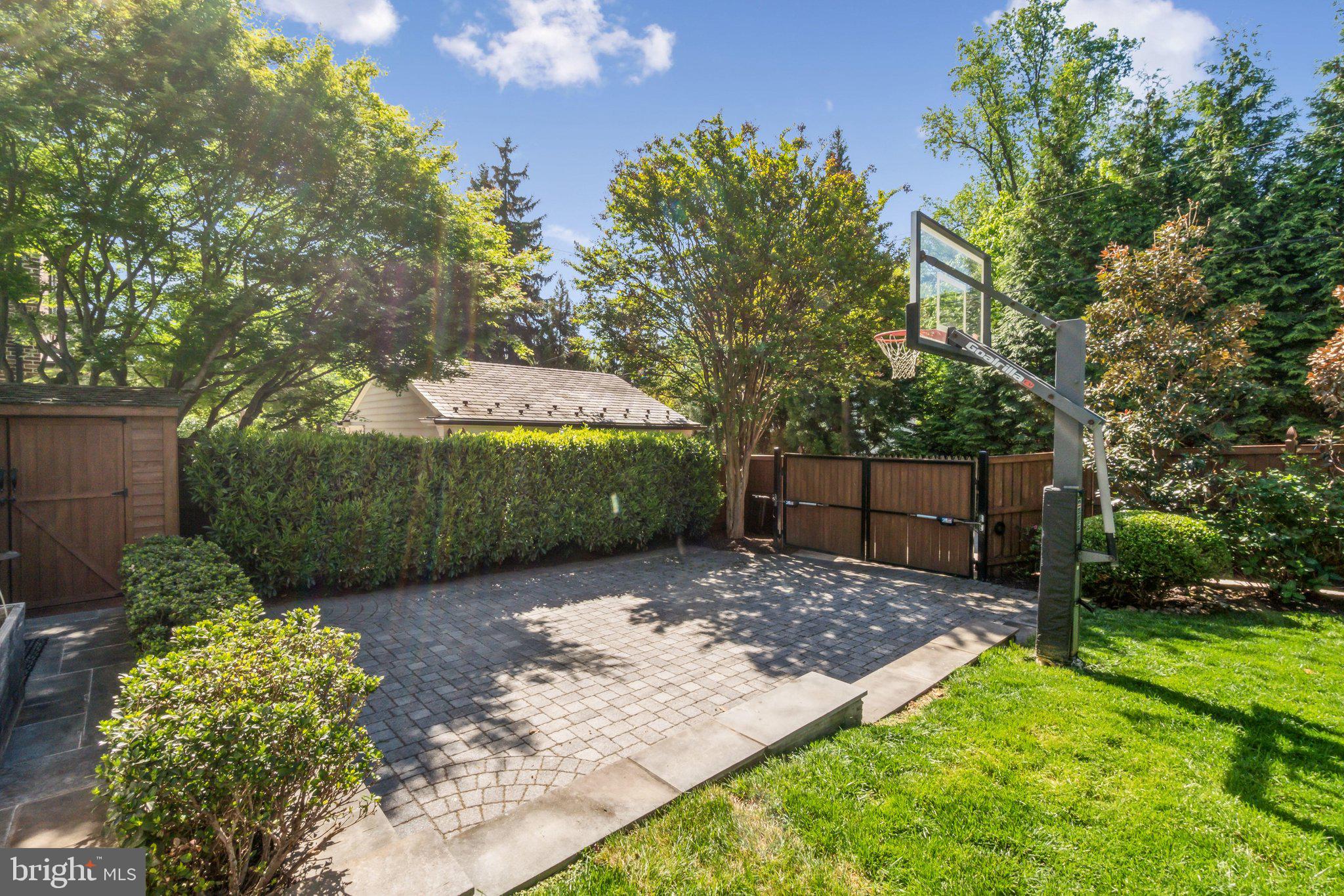 3626 Brandywine Street Northwest Washington, DC 20008 - Photo 35 of 42 a backyard of a house with lots of green space