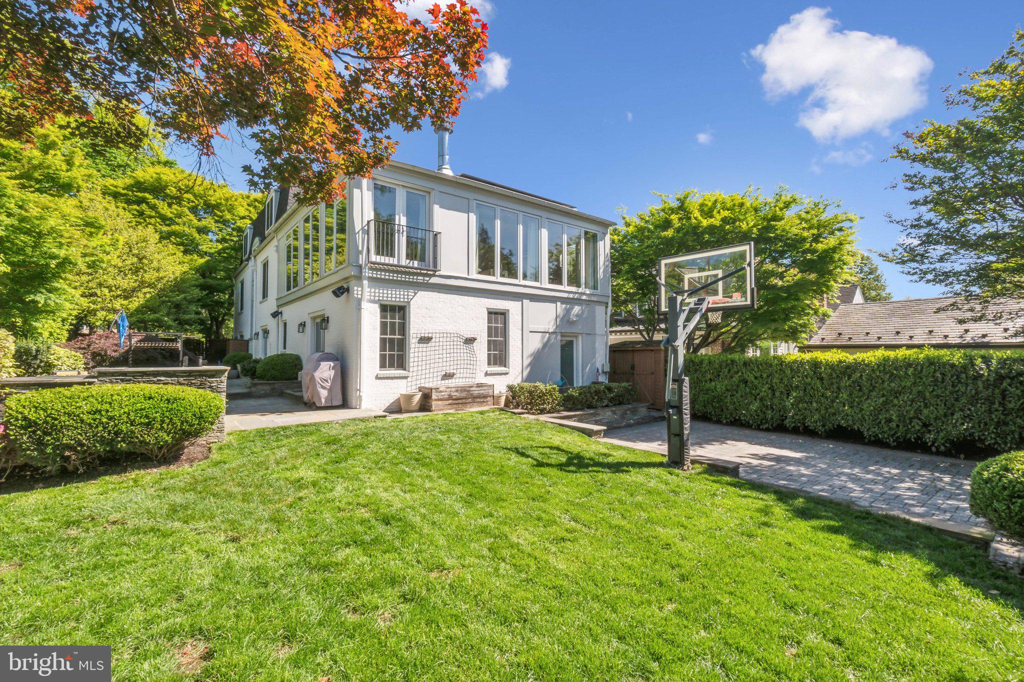 3626 Brandywine Street Northwest Washington, DC 20008 - Photo 39 of 42 a view of a house with a yard and tree s