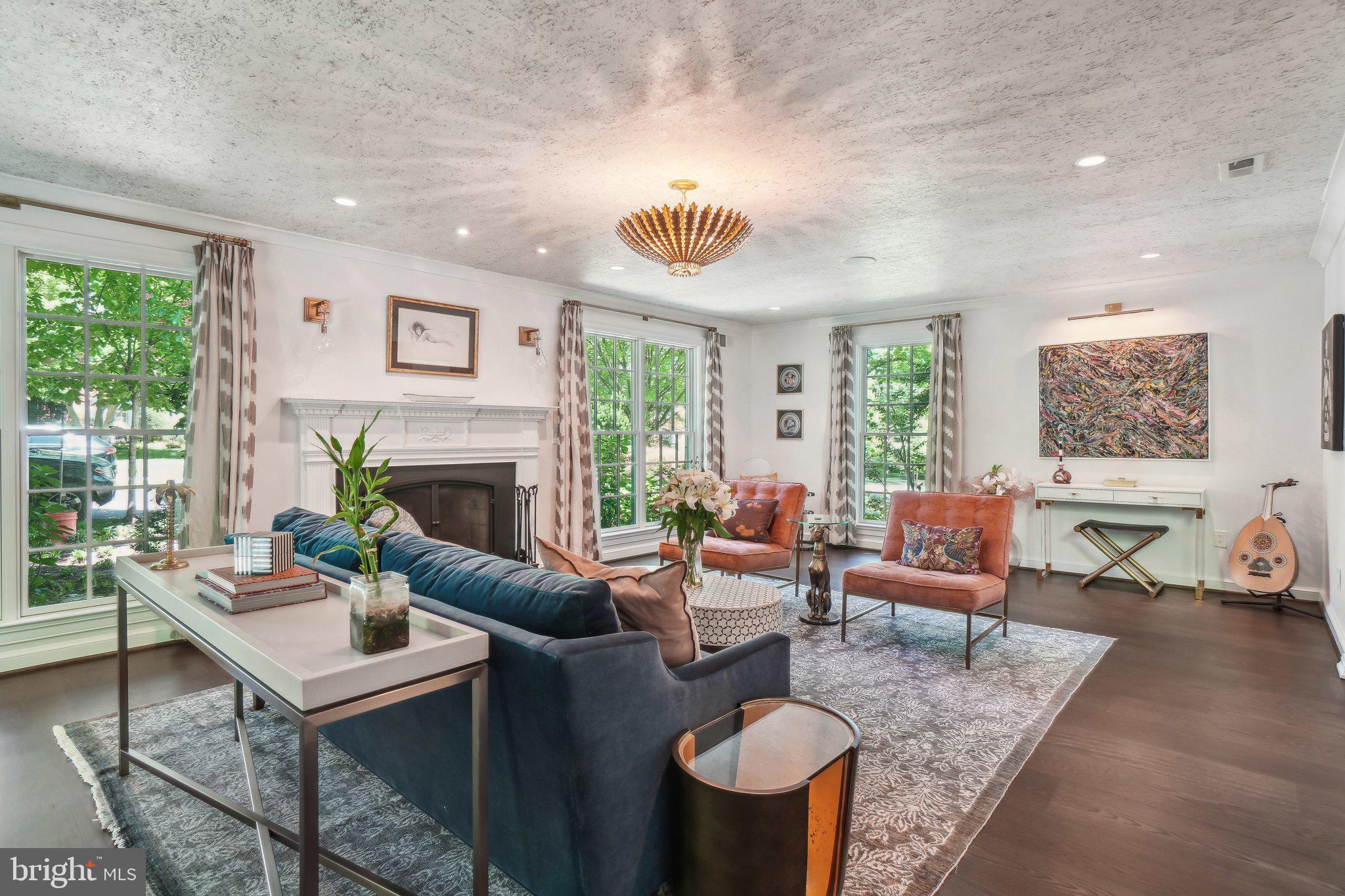 3626 Brandywine Street Northwest Washington, DC 20008 - Photo 4 of 42 a living room with furniture and a fireplace