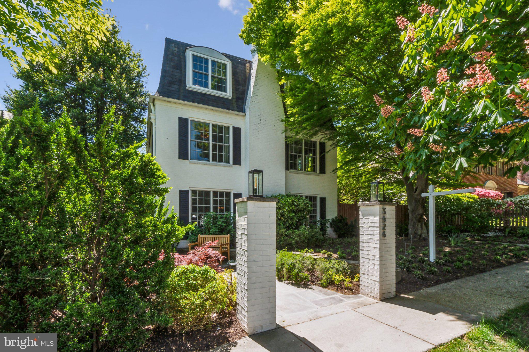 3626 Brandywine Street Northwest Washington, DC 20008 - Photo 41 of 42 front view of a house with a yard