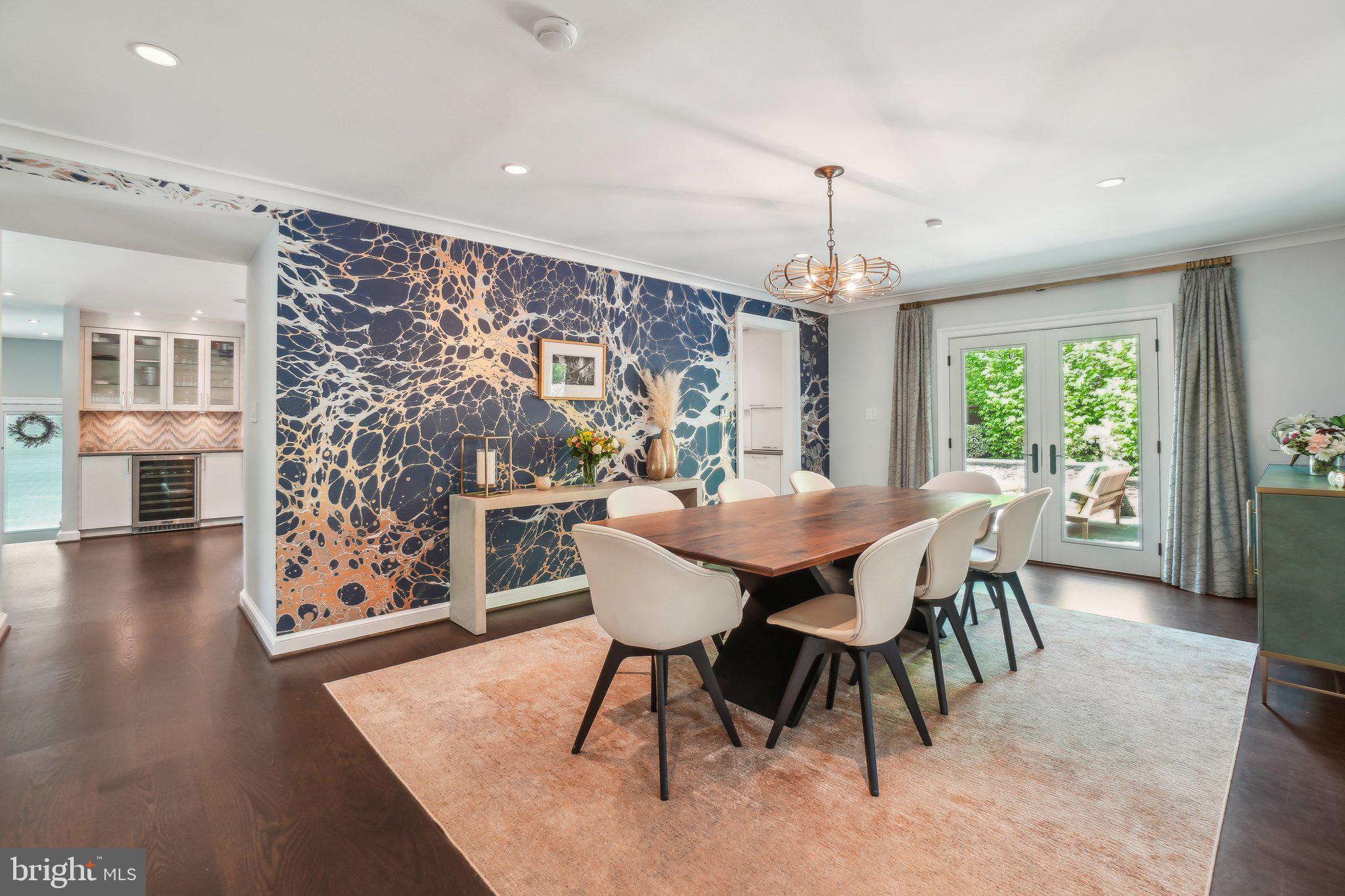 3626 Brandywine Street Northwest Washington, DC 20008 - Photo 6 of 42 a view of a dining room with furniture window and wooden floor