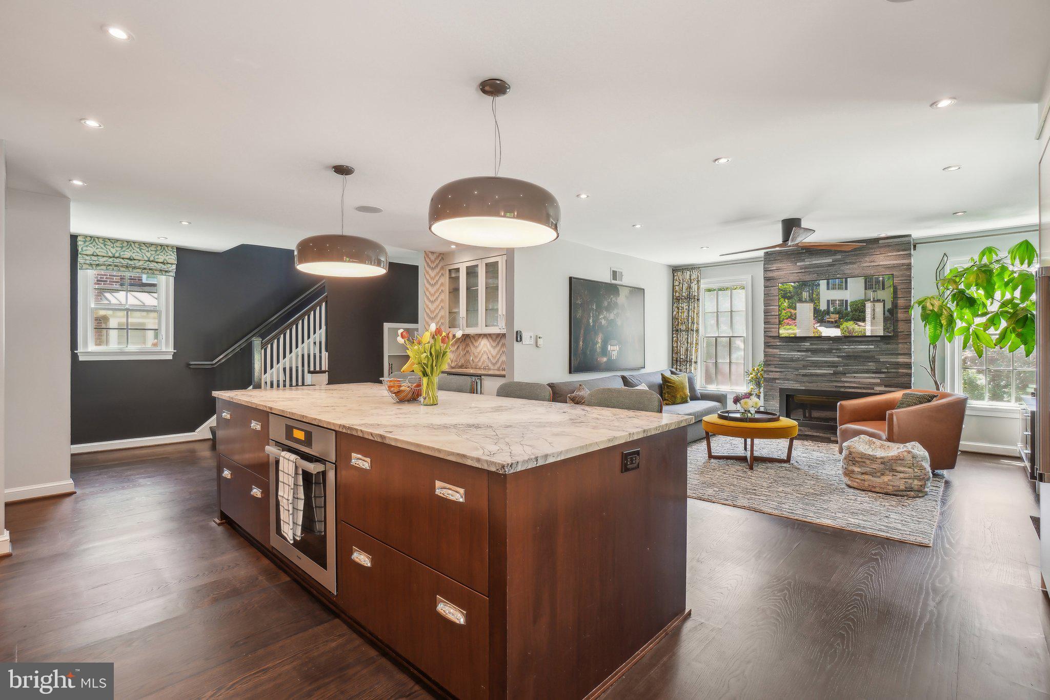 3626 Brandywine Street Northwest Washington, DC 20008 - Photo 10 of 42 a kitchen with stainless steel appliances granite countertop a stove and a wooden floors