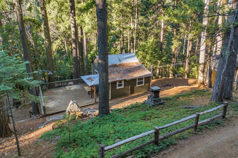 6148 Little Mountain Road Somerset, CA 95684 - Photo 19 of 39 a view of a house with backyard