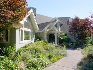 45 Rock Road Kentfield, CA 94904 - Photo 2 of 10 front view of house with a yard and potted plants