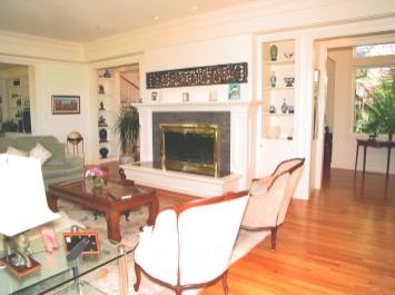 45 Rock Road Kentfield, CA 94904 - Photo 8 of 10 a living room with furniture a table and wooden floor