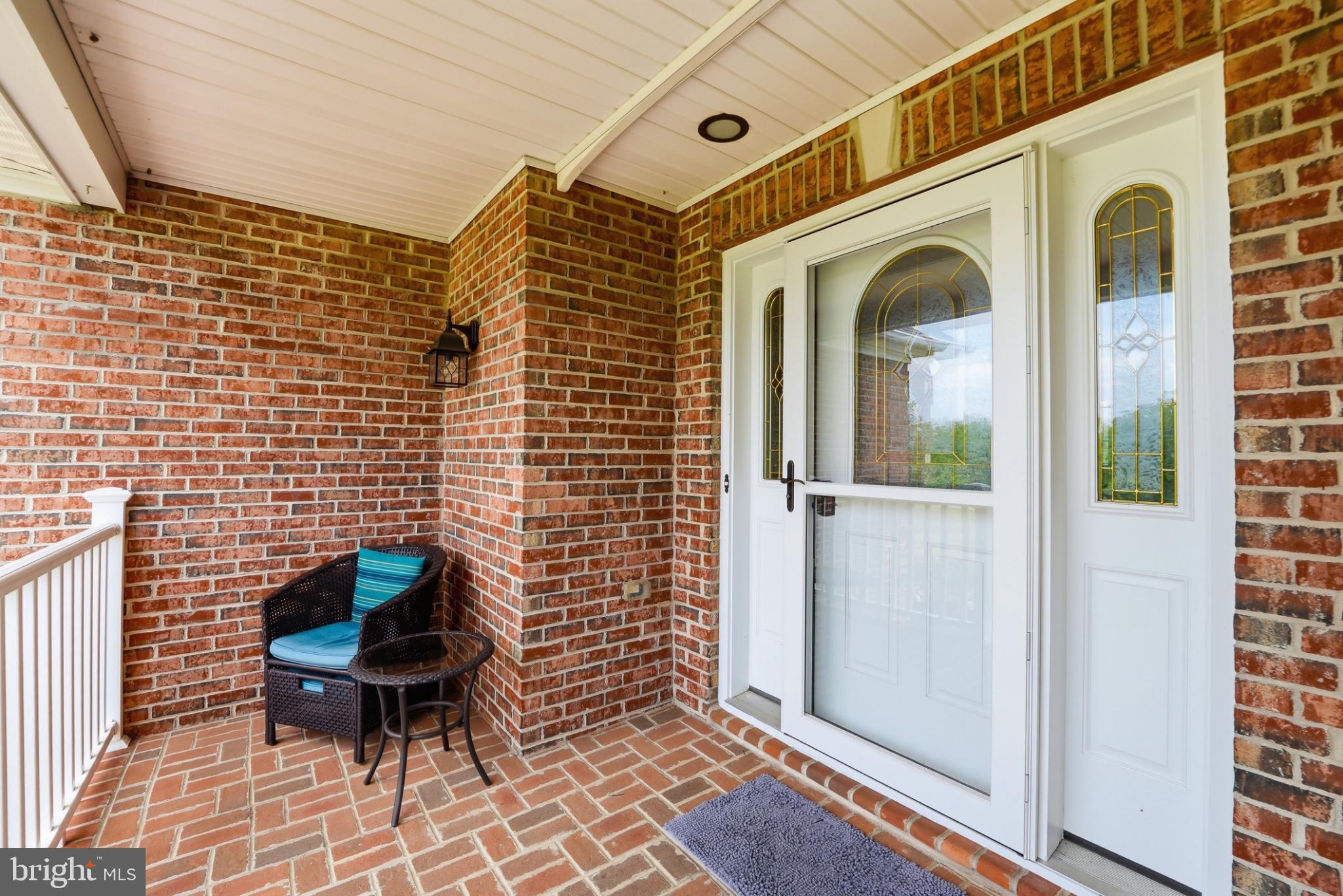 11337 Old Stillhouse Road Boston, VA 22713 - Photo 10 of 58 a view of a door and chair and table in the balcony