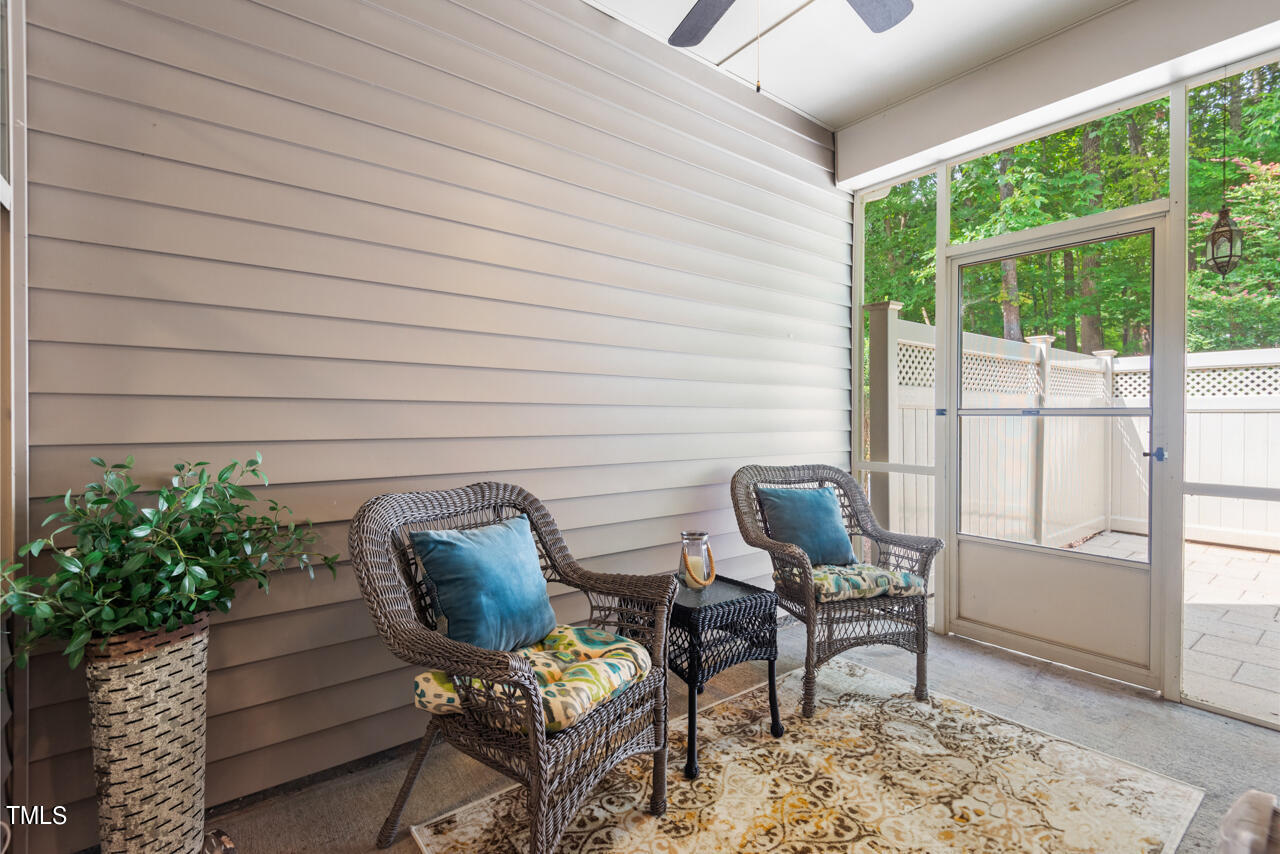 26 Intuition Circle Durham, NC 27705 - Photo 16 of 42 a view of a workspace with furniture and a yard