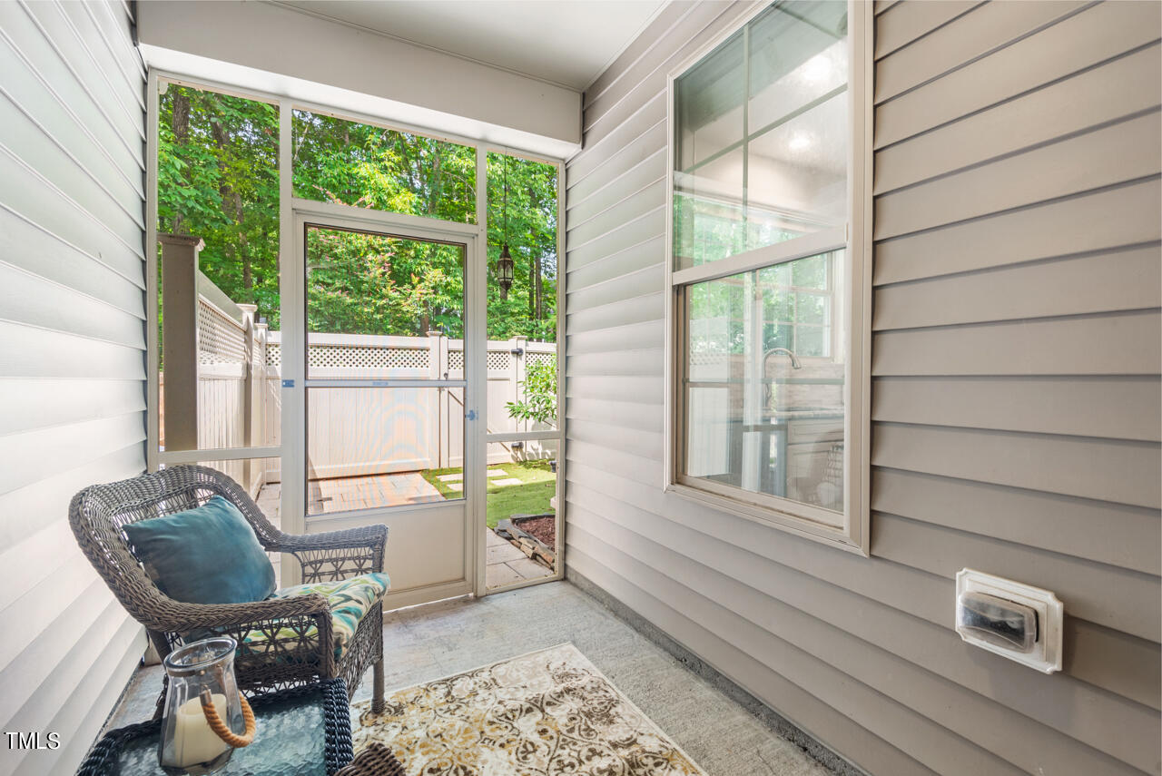 26 Intuition Circle Durham, NC 27705 - Photo 17 of 42 a view of a workspace with furniture and a window