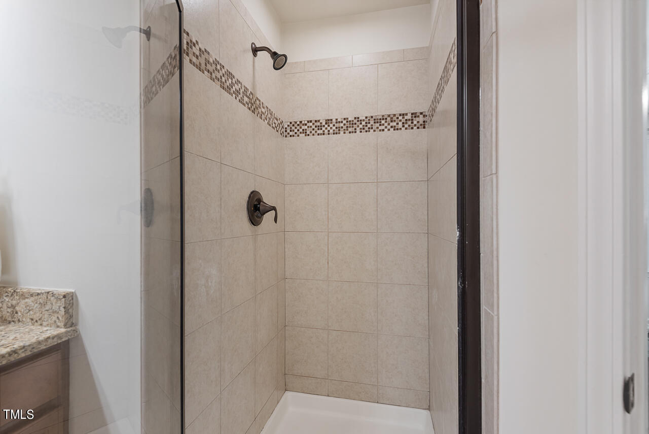 26 Intuition Circle Durham, NC 27705 - Photo 25 of 42 a bathroom with a shower