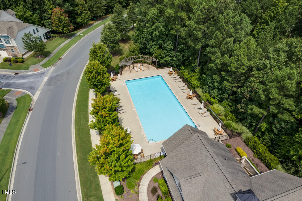 26 Intuition Circle Durham, NC 27705 - Photo 35 of 42 a view of a swimming pool with a yard