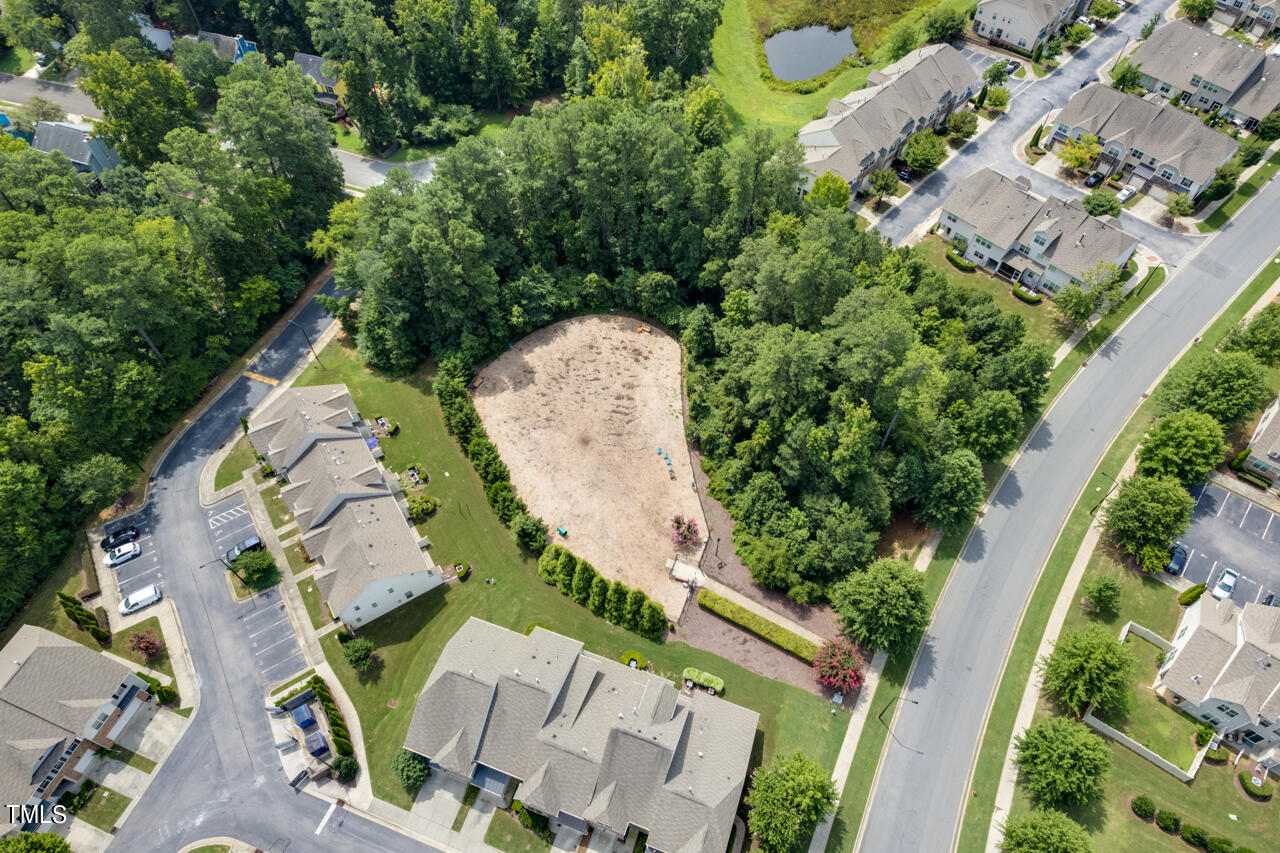 26 Intuition Circle Durham, NC 27705 - Photo 37 of 42 an aerial view of a house with garden space and street view