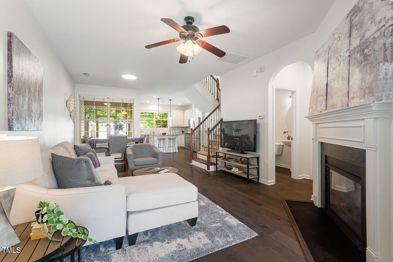 26 Intuition Circle Durham, NC 27705 - Photo 5 of 42 a living room with furniture fireplace and flat screen tv