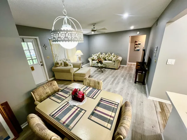 a view of a dining room with furniture