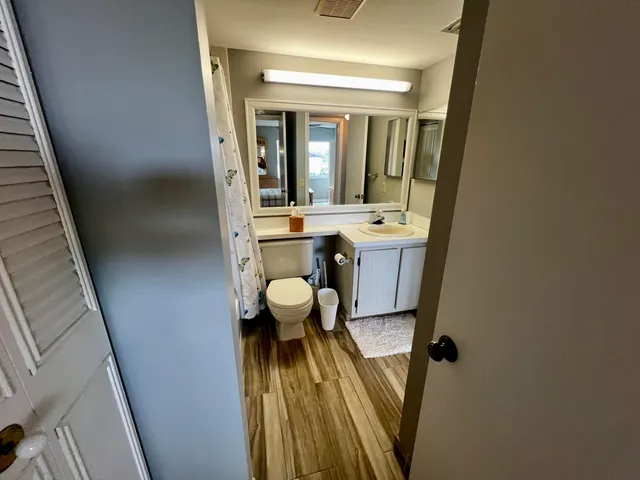 a bathroom with a sink and mirror