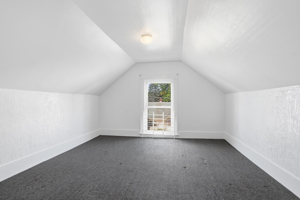 12 Whitcomb Street Webster, MA 01570 - Photo 27 of 40 an empty room with a window
