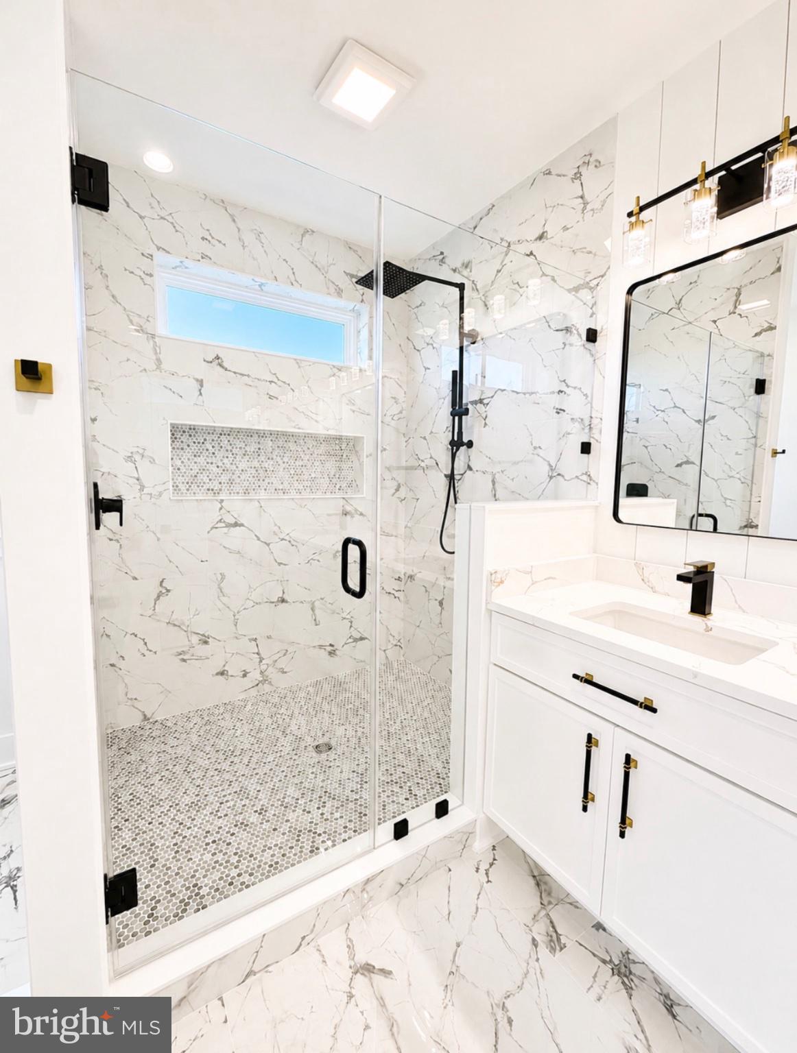 21963 Hardscrabble Road Georgetown, DE 19947 - Photo 26 of 43 Elegant marble bathroom retreat.