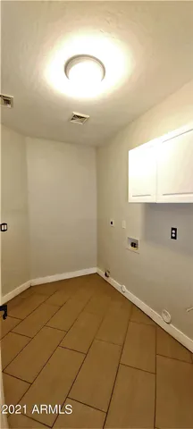 a view of room with a ceiling fan