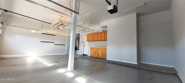 a view of a house with a tree