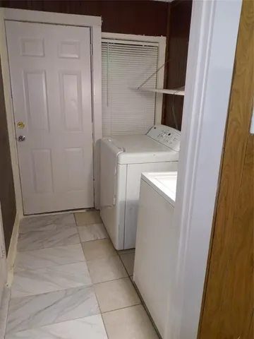 a utility room with a washer and dryer