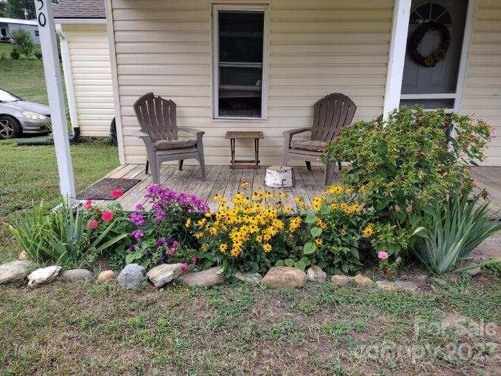 150 Raby Street Canton, NC 28716 - Photo 4 of 38 a front view of house with an outdoor seating