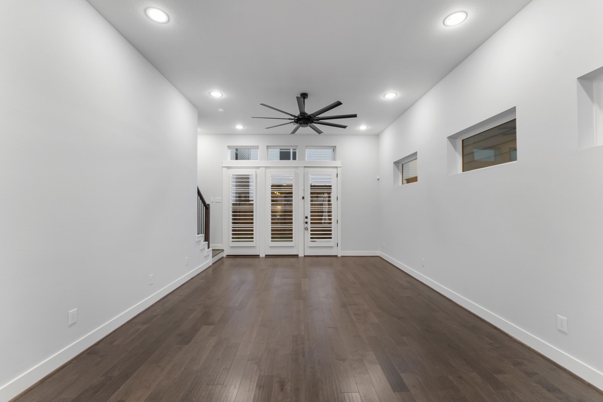 113 Coronado Street Houston, TX 77009 - Photo 15 of 39 wooden floor in an empty room with a window
