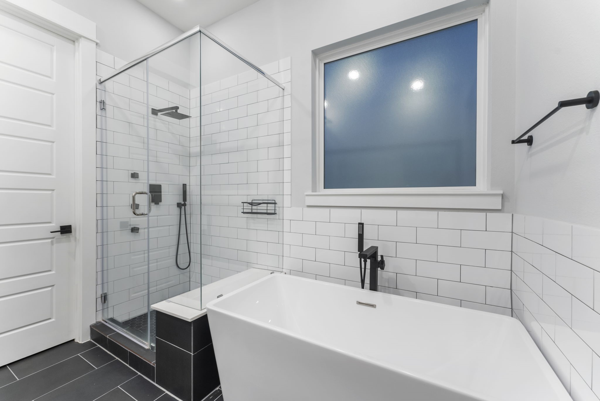 113 Coronado Street Houston, TX 77009 - Photo 26 of 39 a bathroom with a sink and shower