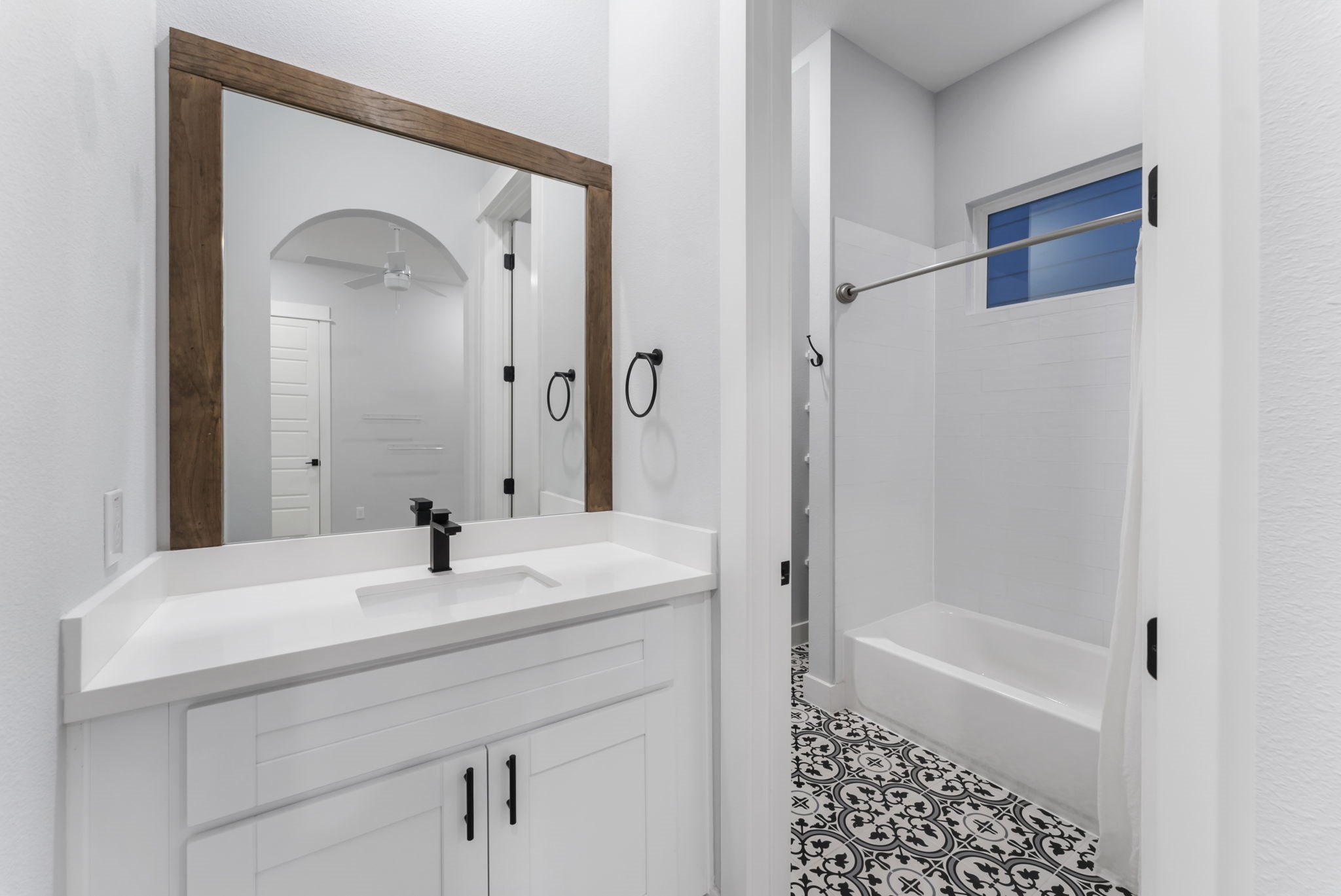 113 Coronado Street Houston, TX 77009 - Photo 34 of 39 a bathroom with a sink a vanity and a mirror