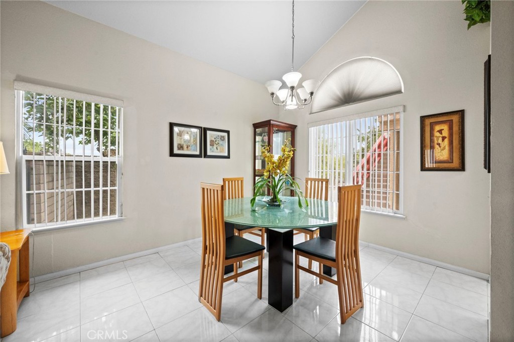 605 Bronco Way Walnut, CA 91789 - Photo 12 of 69 a view of a dining room with furniture window and wooden floor