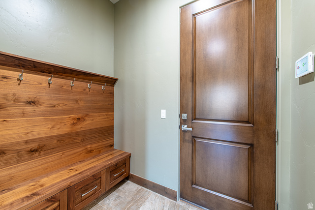 322 340 E Street Ivins, UT 84738 - Photo 44 of 61 Built-in wood-finish storage bench with integrated drawers and coat hooks