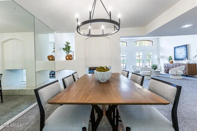 a close view of dining table with potted plants