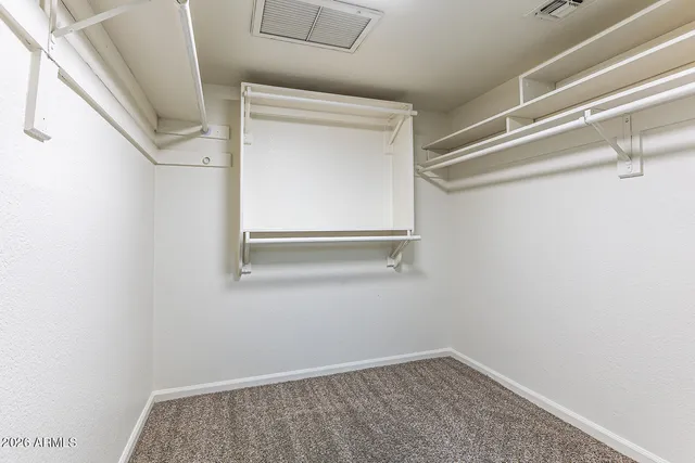 a balcony view with a seating space