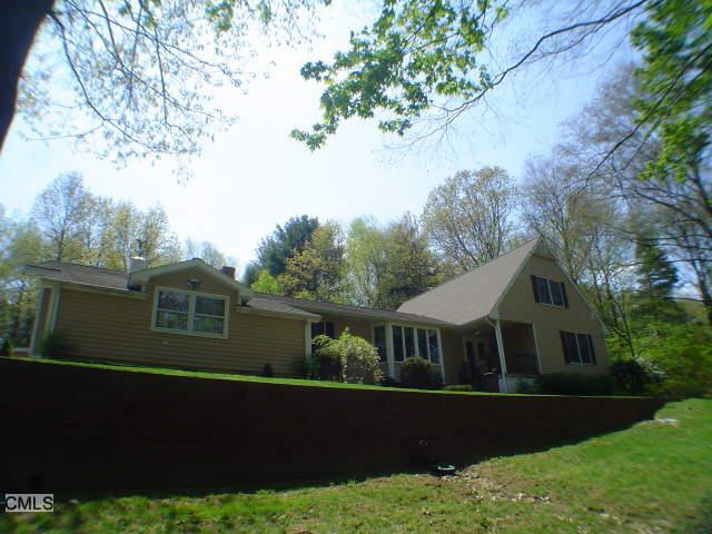 49 Lake George Road Brookfield, CT 06804 - Photo 1 of 1 a front view of a house with a yard