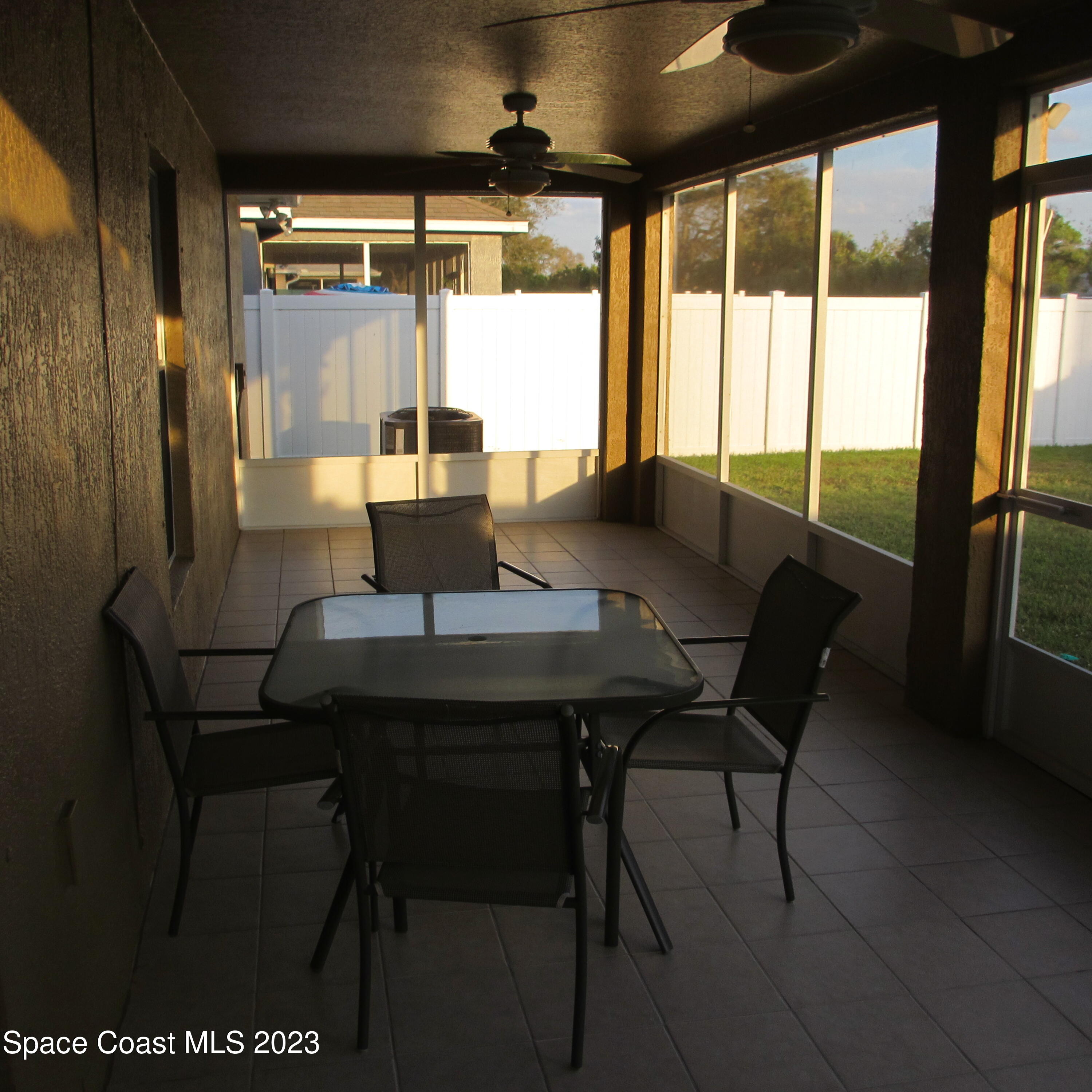 1925 Canopy Drive Melbourne, FL 32935 - Photo 11 of 17 a view of a dining room with furniture and a window