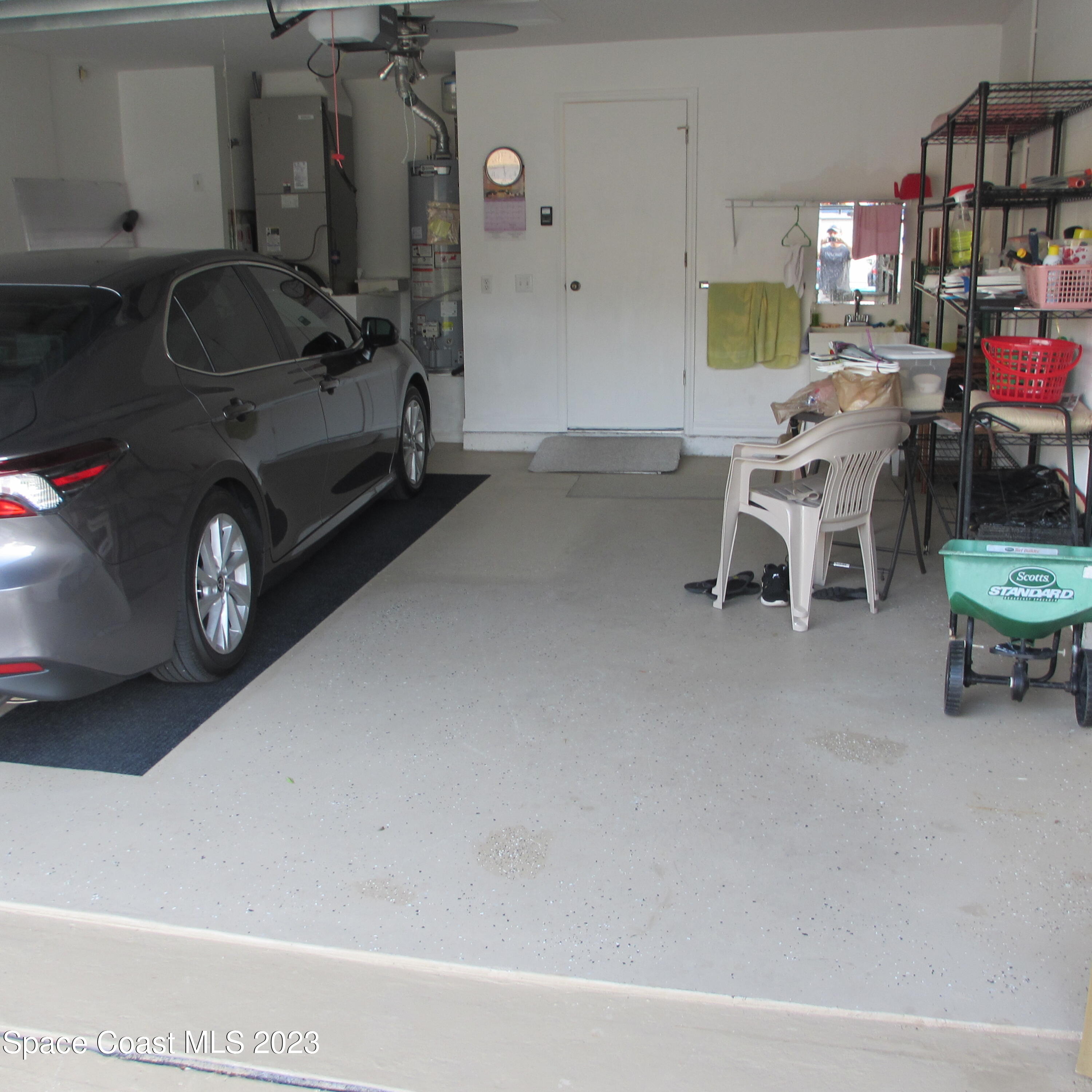 1925 Canopy Drive Melbourne, FL 32935 - Photo 16 of 17 a view of a car garage