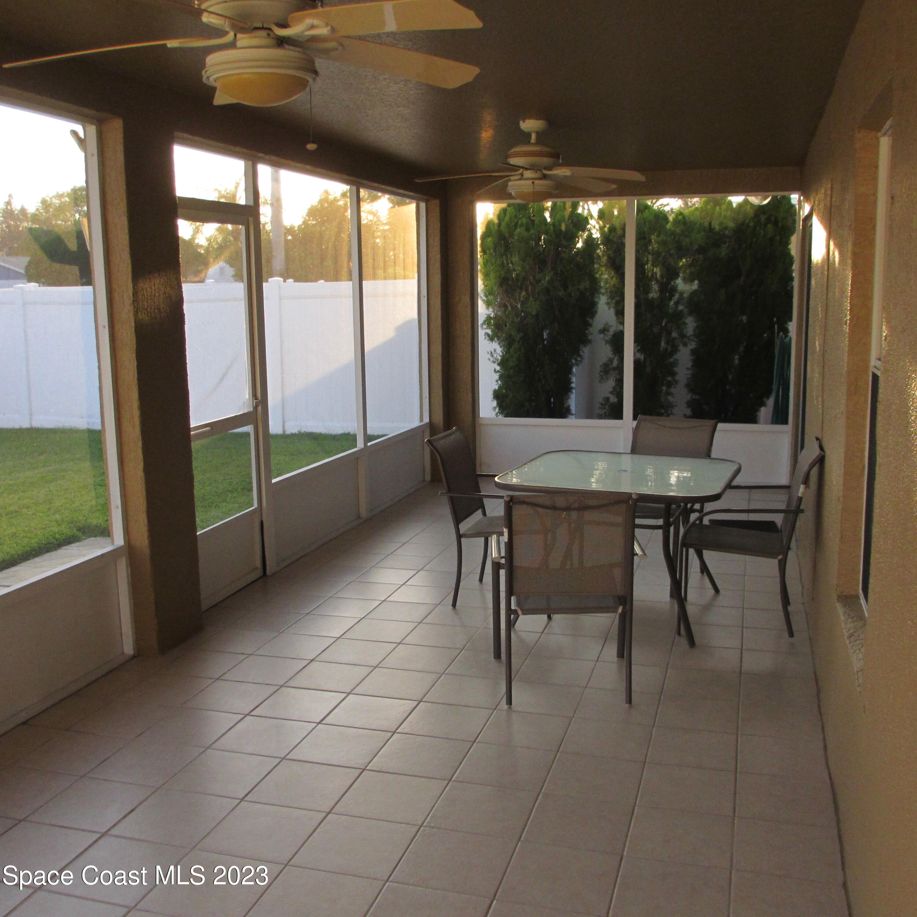 1925 Canopy Drive Melbourne, FL 32935 - Photo 10 of 17 a dining room with furniture and window