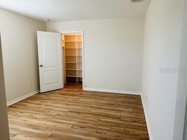 1276 Priory Circle Winter Garden, FL 34787 - Photo 27 of 37 a view of an empty room with closet and entryway