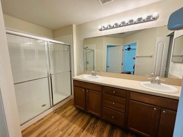 1276 Priory Circle Winter Garden, FL 34787 - Photo 37 of 37 a bathroom with a double vanity sink and mirror