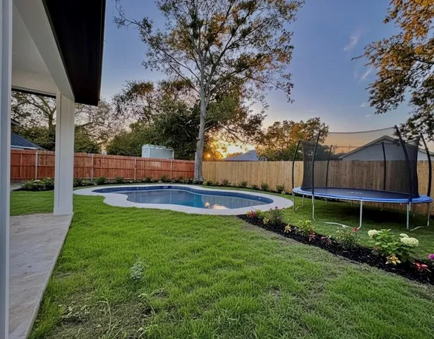 a view of garden with patio