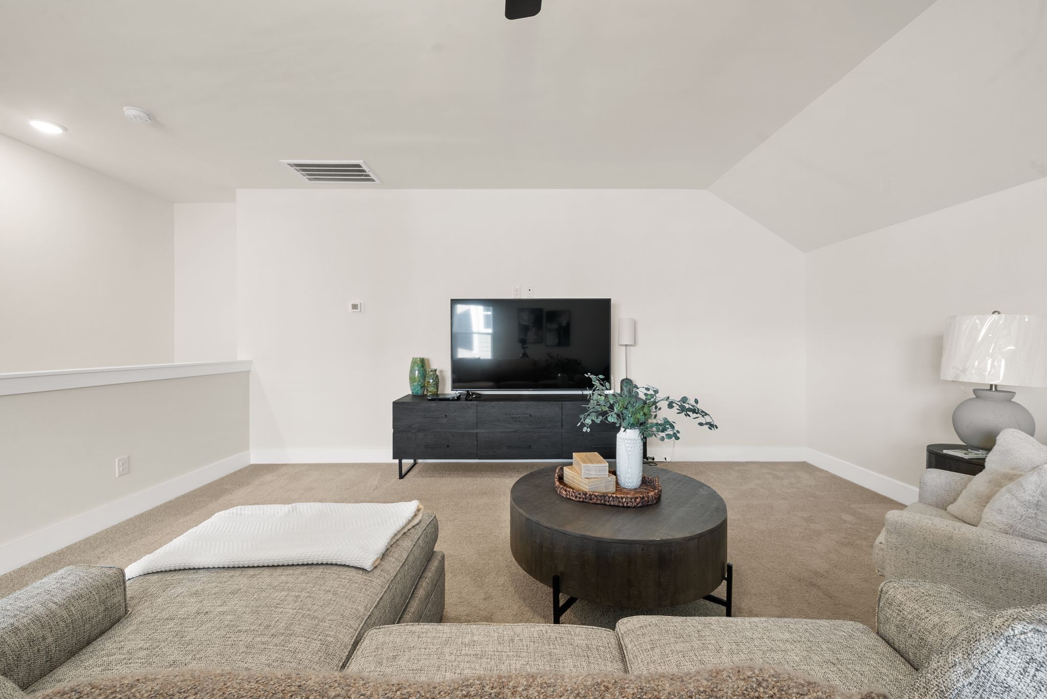 4043 John Marsh Road Spring Hill, TN 37174 - Photo 52 of 56 a living room with furniture and a flat screen tv